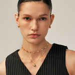 Gold Stud Earrings with Champagne Zircon and Pave Claw | MaiaMina