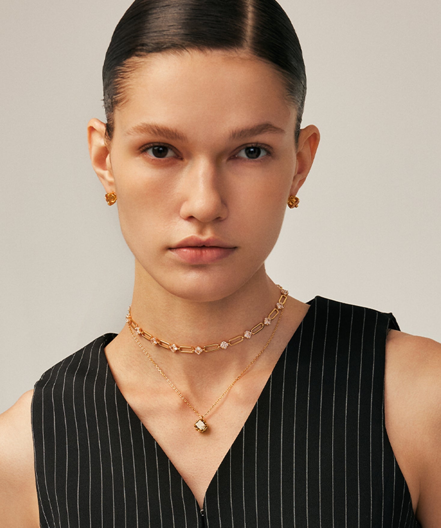 Gold Stud Earrings with Champagne Zircon and Pave Claw | MaiaMina