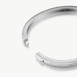 MaiaMina Rhodium Plated Textured Bangle Bracelet with Starburst Details Cetus Collection