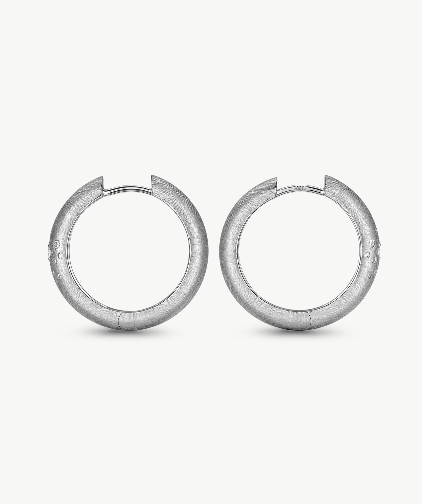 MaiaMina Rhodium Plated Starburst Hoop Earrings with Zircon Accents Cetus Collection