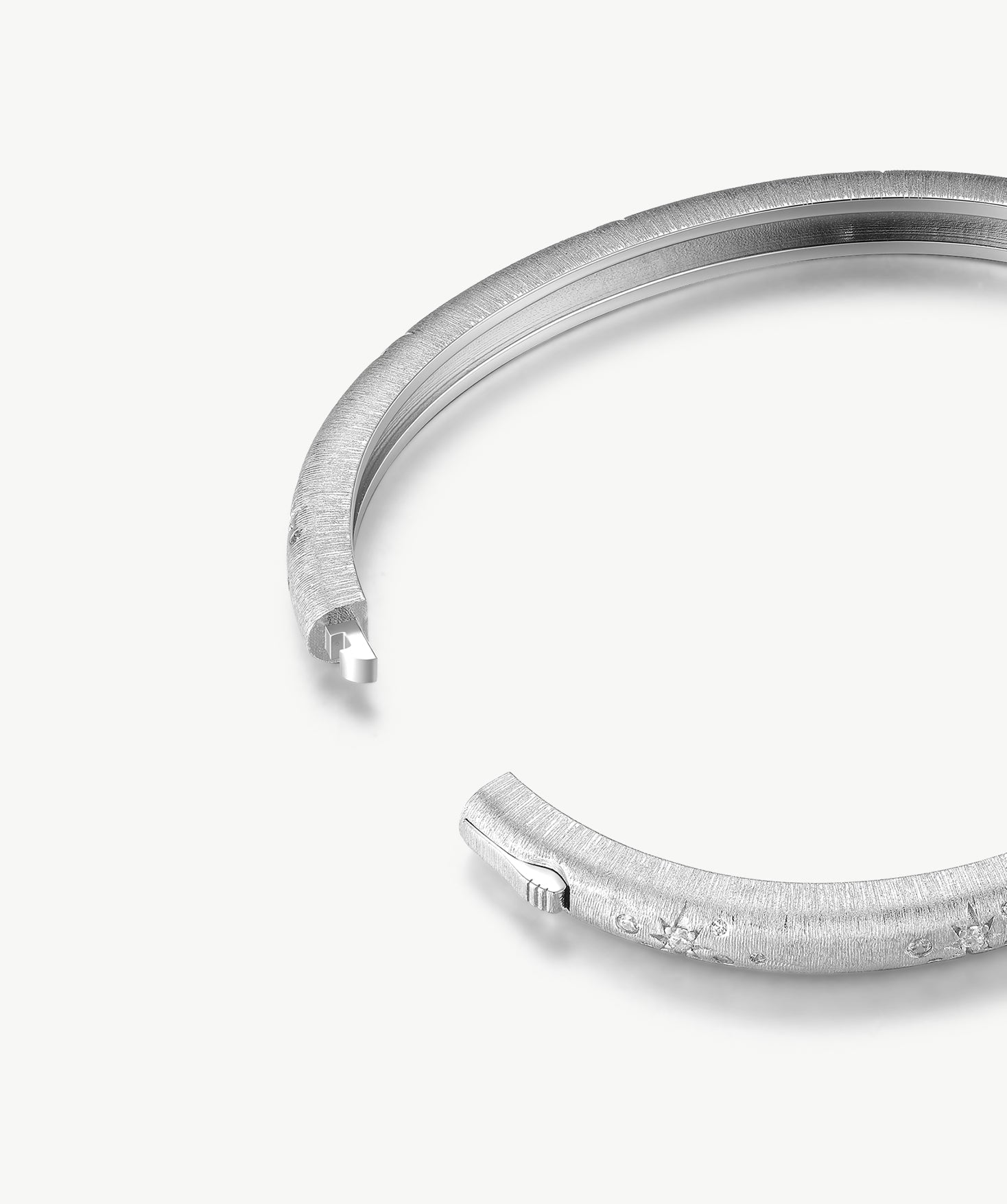 MaiaMina Rhodium Plated Textured Bangle Bracelet with Starburst Details Cetus Collection