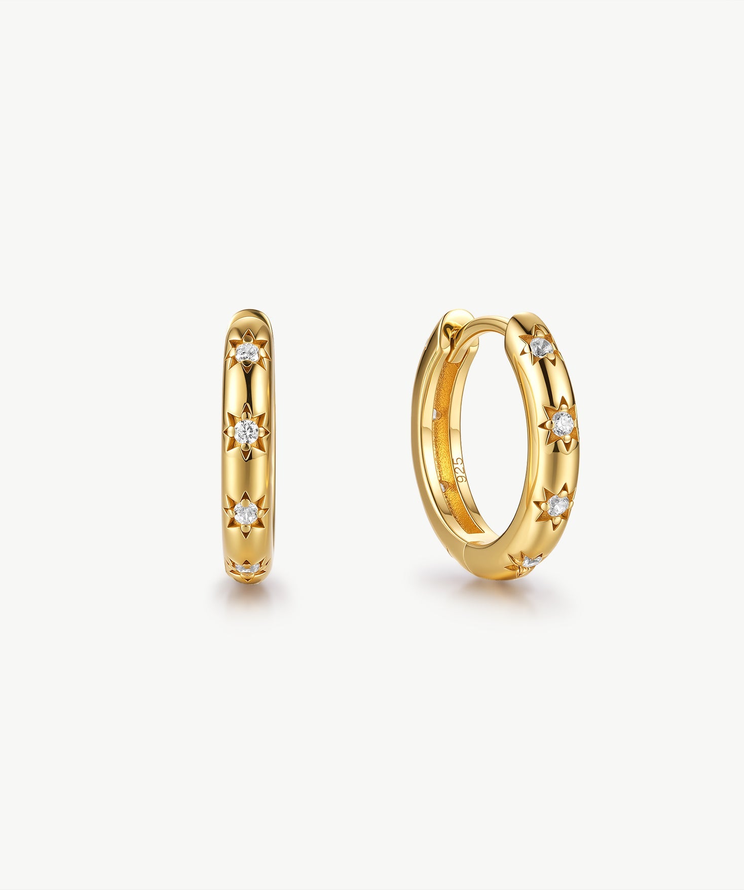 Gold Celestial Star Huggie Earrings | Belvria