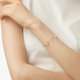 MaiaMina Rhodium Plated Sterling Silver White Crystal Charm Bracelet Cetus Collection