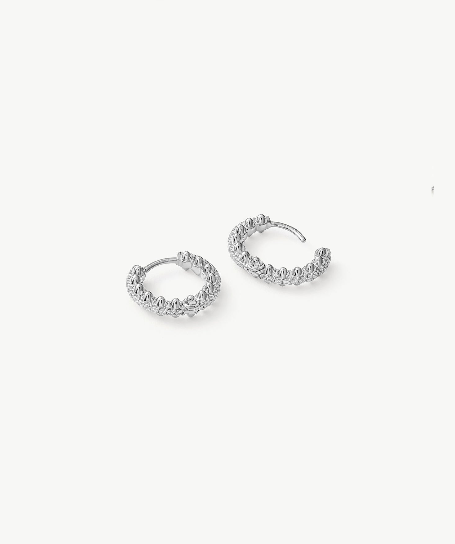 Rock Pave Spike Hoop Earrings in Silver – Edgy Modern Huggies | MaiaMina